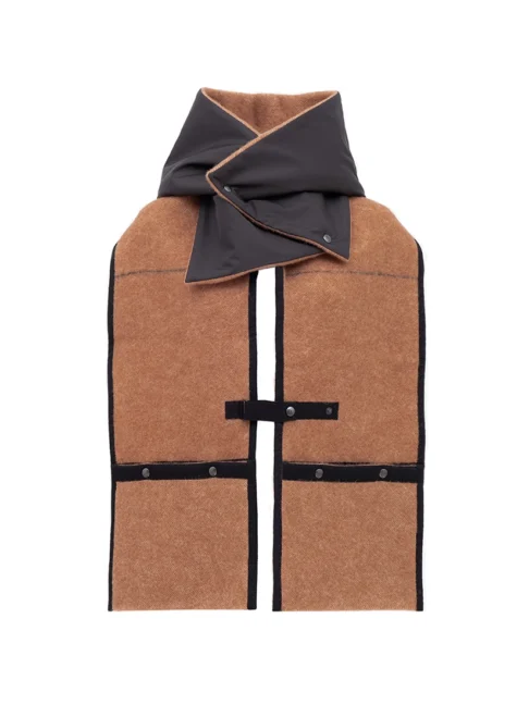 A brown wool pocket scarf featuring a dark grey collar, black strap closures, and pockets with white borders, laid out on a white backdrop.