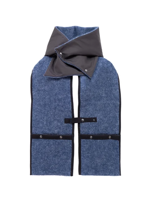 A navy blue wool pocket scarf with a contrasting grey collar, black strap closures, and white-bordered pockets, presented on a white background.