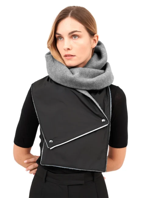 Model wearing a grey hooded scarf made from upcycled fabric with a woven texture.