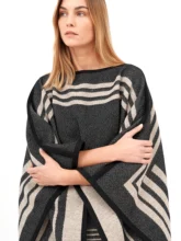 Black wool reversible poncho with a modern look.