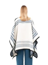 Blue and white reversible poncho with a clean white exterior.