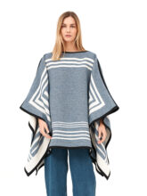 Reversible poncho. Made of wool and cotton using zero waste and slow fashion design principles. Poncho can be worn either blue side out, or white side out.