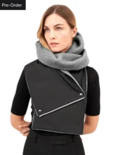 Model wearing a grey hooded scarf made from upcycled fabric with a woven texture.