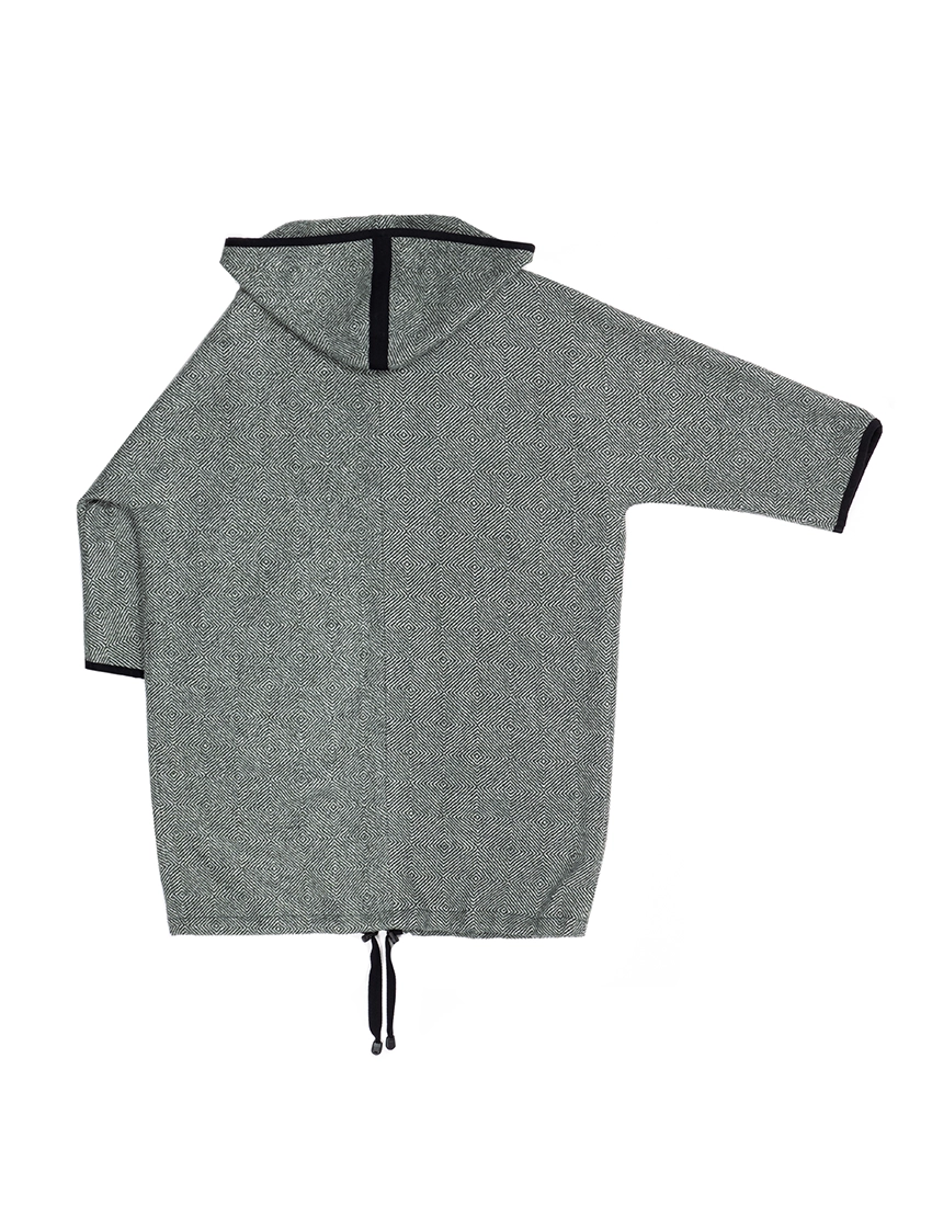 Flat lay of a long, green merino wool hoodie showcasing the full length, hood, and optional features like pockets or drawstrings.